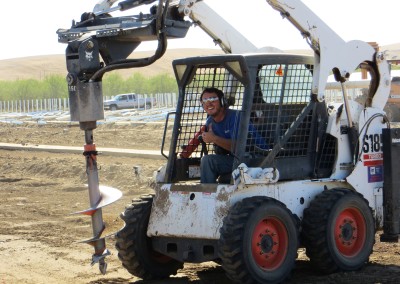 digging holes for the greenhouse